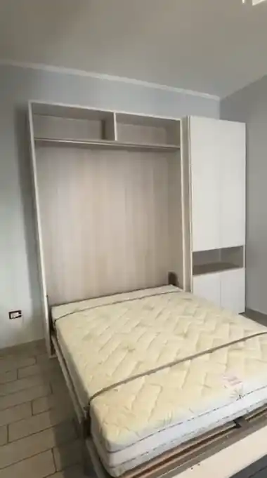 Letto a scomparsa Magic matrimoniale aperto con materasso alto - Livein Camerette